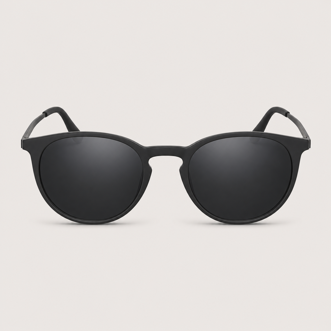 Monte Aure Nero Road black round sunglasses on a light studio background